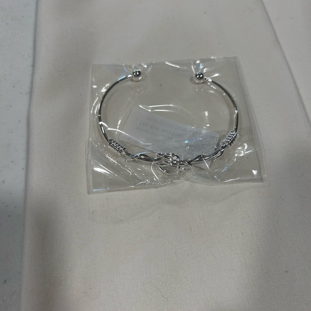 Elegant Sterling Silver Knot Bangle Bracelet